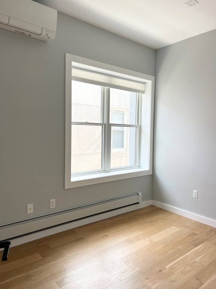 945 77th St #2ndFL - Photo 4 of 14