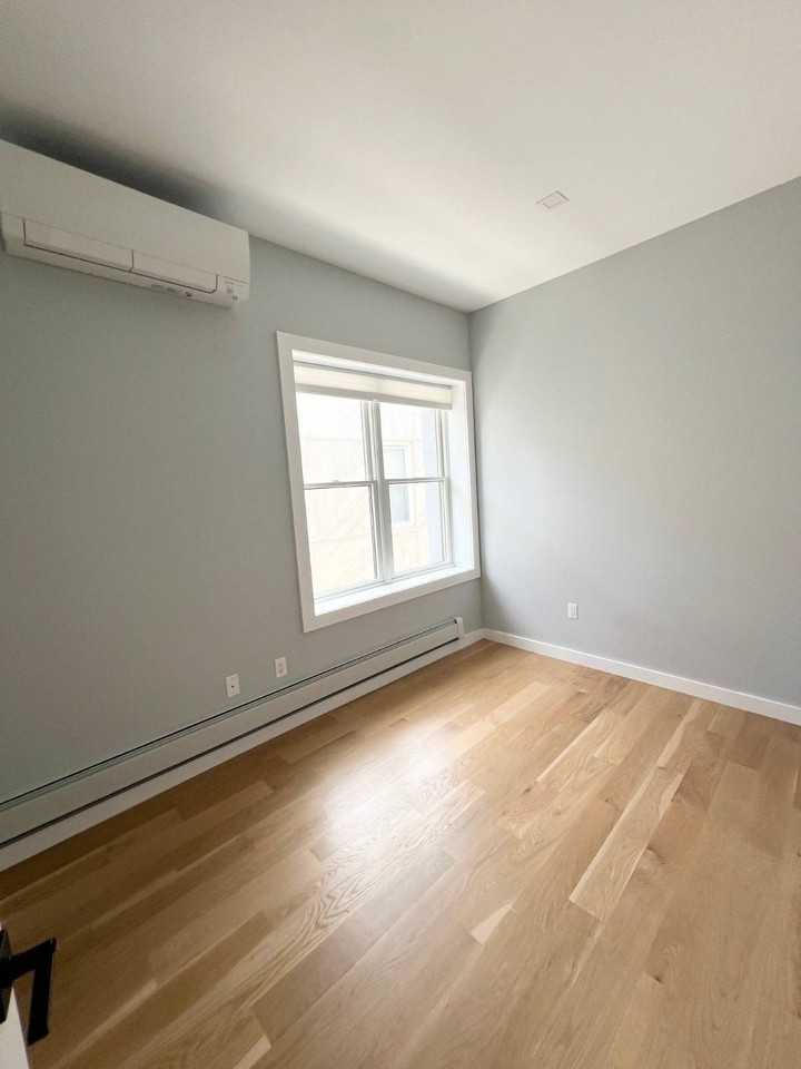 945 77th St #2ndFL - Photo 5 of 14