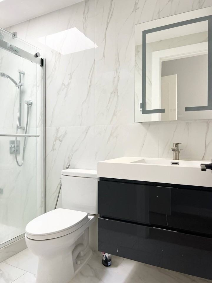 945 77th St #2ndFL - Photo 6 of 14