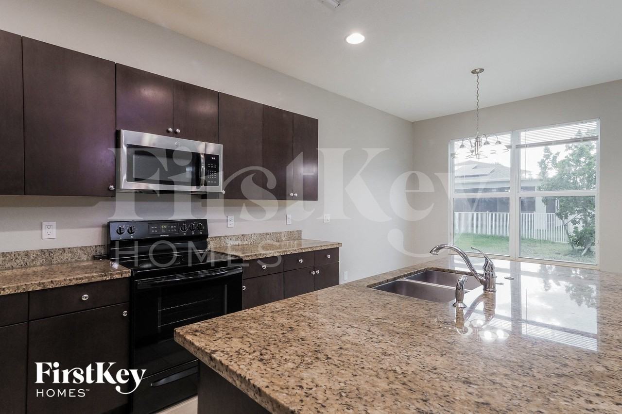 1183 Nw Leonardo Cir - Photo 6 of 15