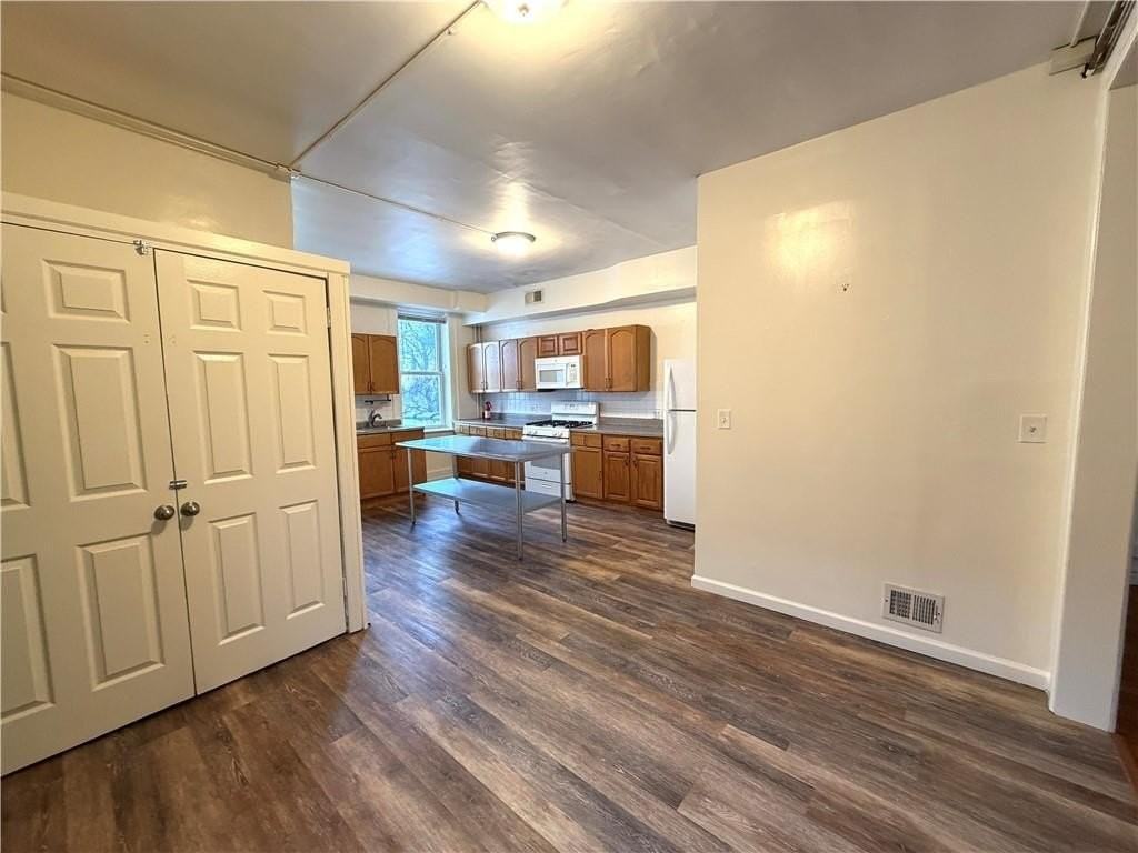 9016 Rockaway Beach Blvd #1 - Photo 3 of 8