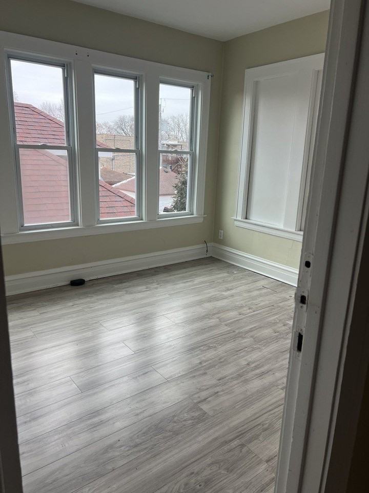 6136 S Mozart St Unit 2 #2 - Photo 5 of 9