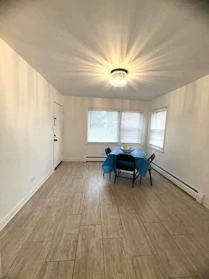 2308 Oakton St Apt 1 #1 - Photo 4 of 8