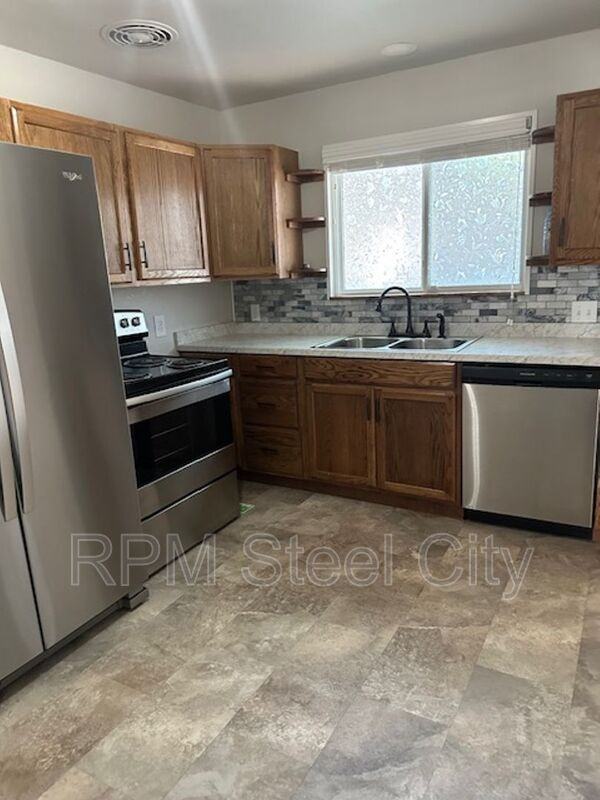 2410 Saint Clair Ave - Photo 6 of 14