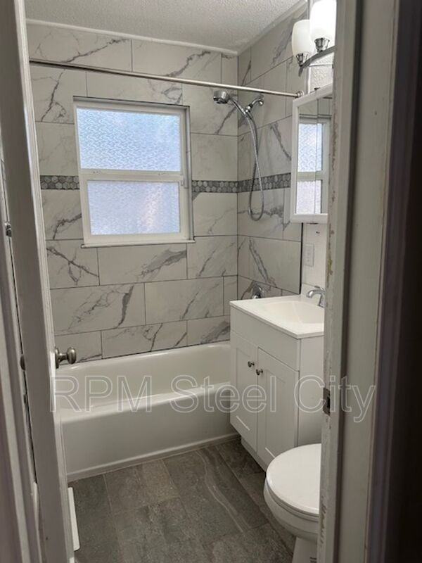 2410 Saint Clair Ave - Photo 7 of 14