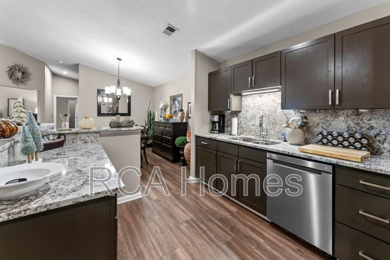 8921 Hunters Creek Dr - Photo 4 of 20