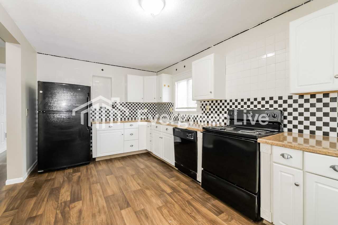 8016 Holmes Rd - Photo 6 of 15