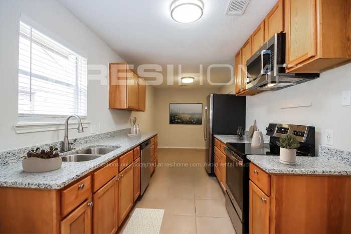 5830 Woodmancote Dr - Photo 3 of 19