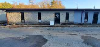 2270 Harper Road - Drear storage area with garage door and office #D - Photo 1 of 1