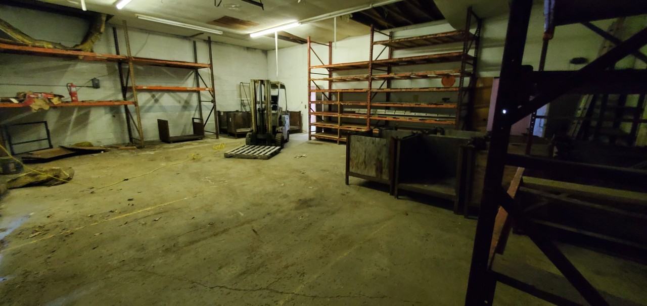 2270 Harper Road - Drear storage area with garage door and office #D - Photo 3 of 8