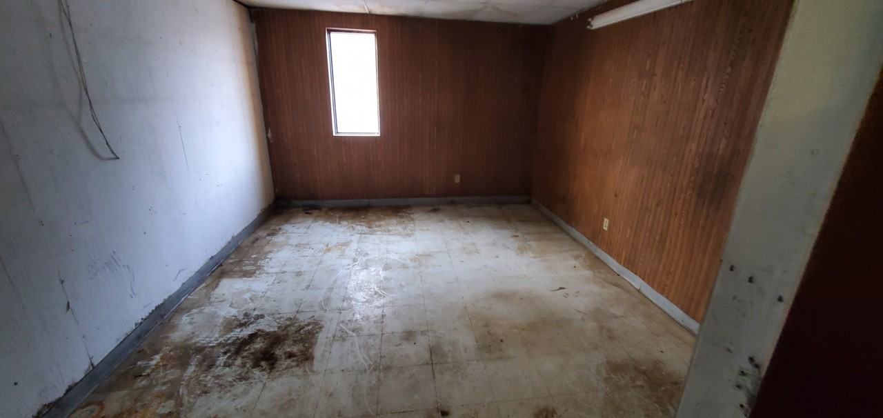 2270 Harper Road - Drear storage area with garage door and office #D - Photo 4 of 8