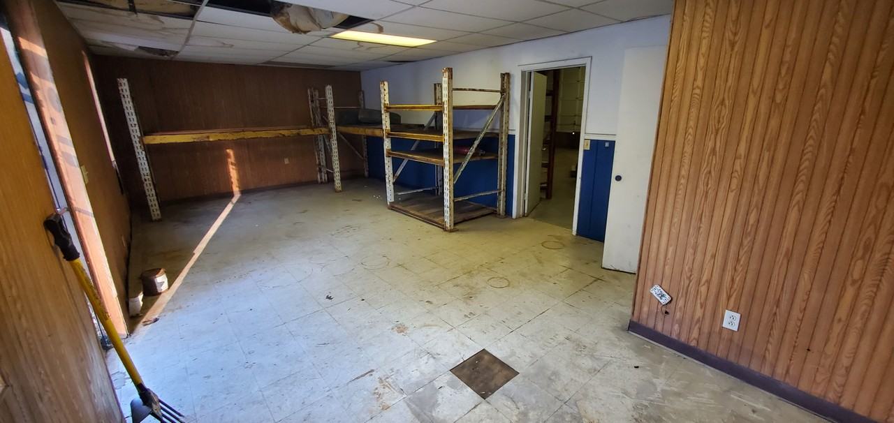 2270 Harper Road - Drear storage area with garage door and office #D - Photo 6 of 8