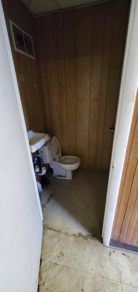 2270 Harper Road - Drear storage area with garage door and office #D - Photo 7 of 8