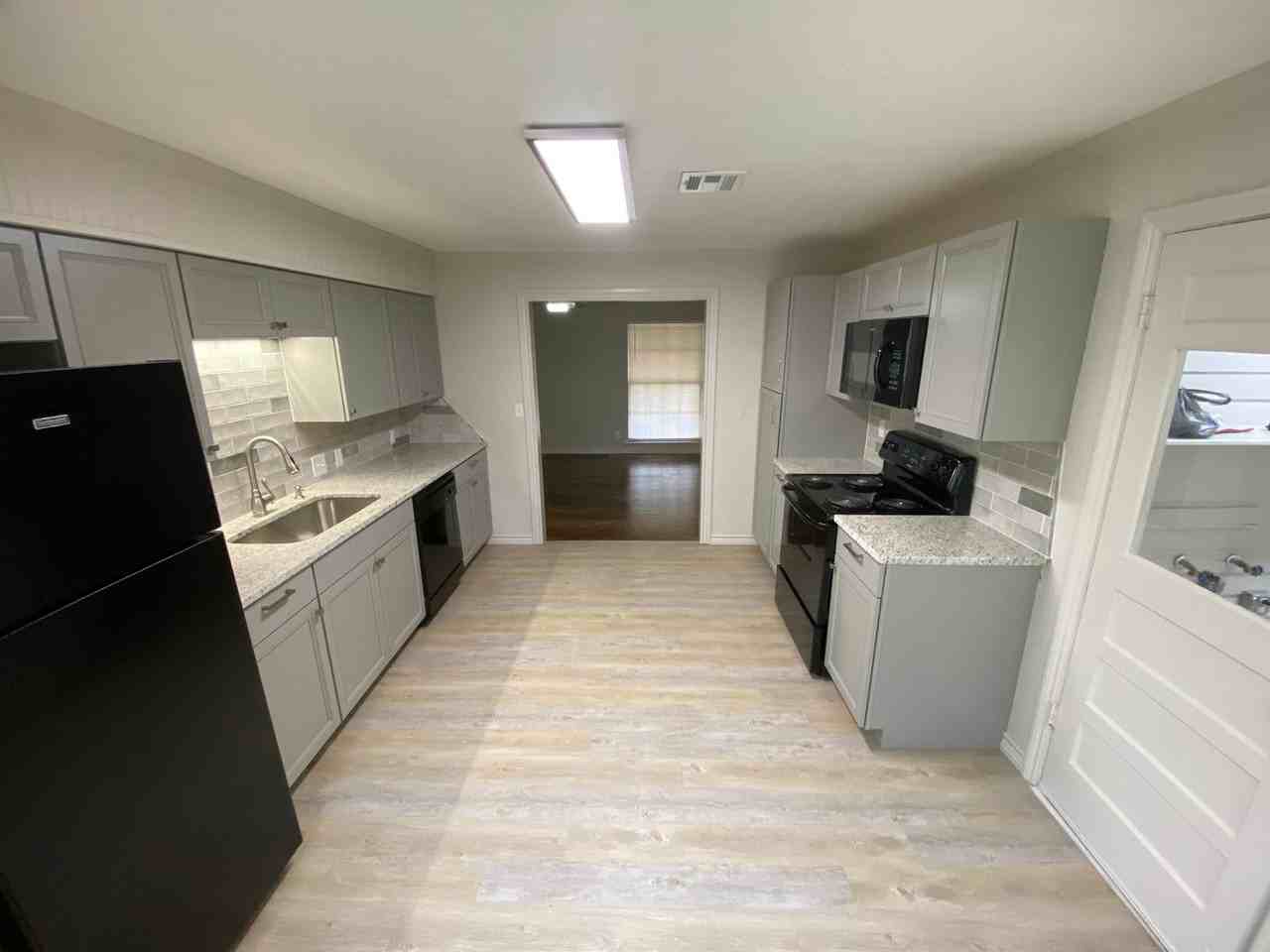 1709 Nw Euclid Ave - Photo 4 of 7