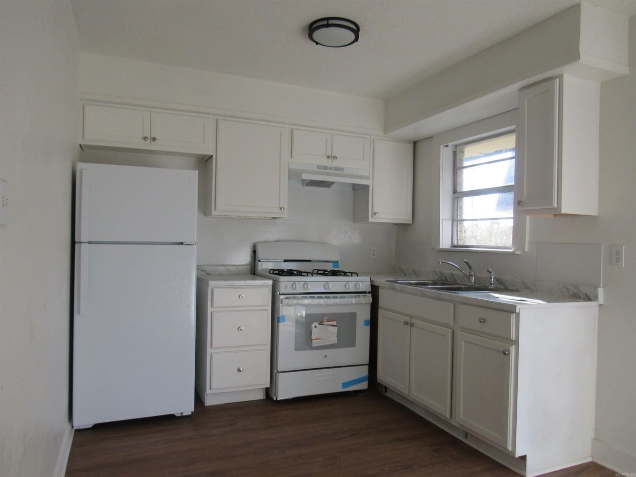 414 W 3rd St - Photo 2 of 13