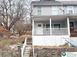 featured image of 207 Spring St