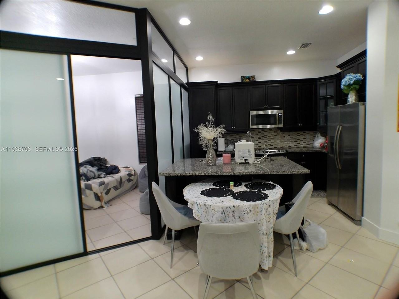 3308 W 95th Ter - Photo 6 of 29