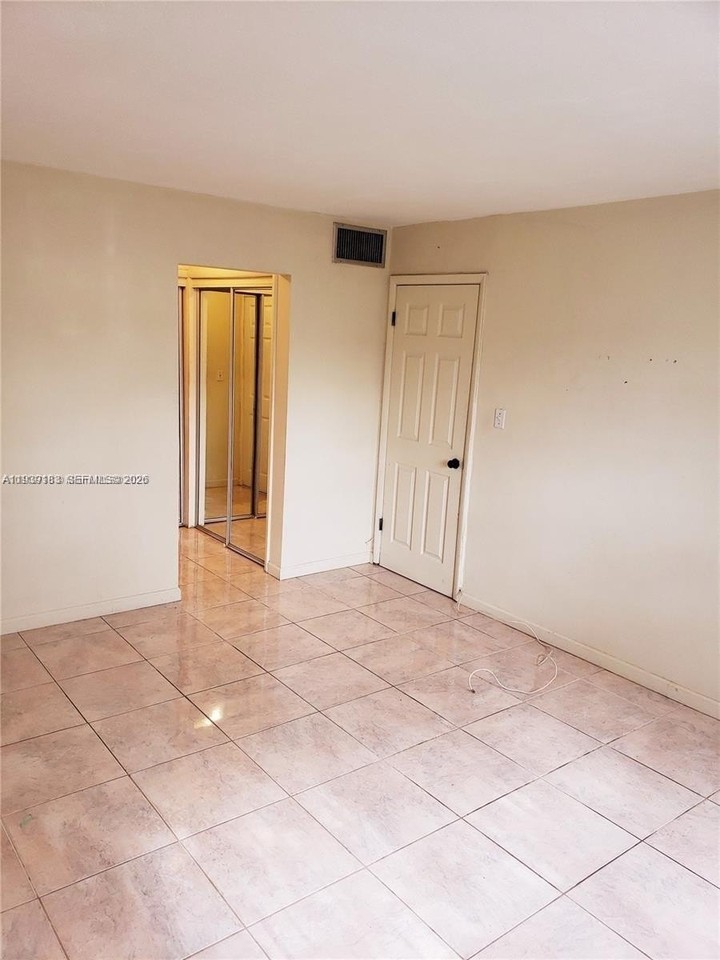 1450 Ne 191st St #201 - Photo 3 of 12