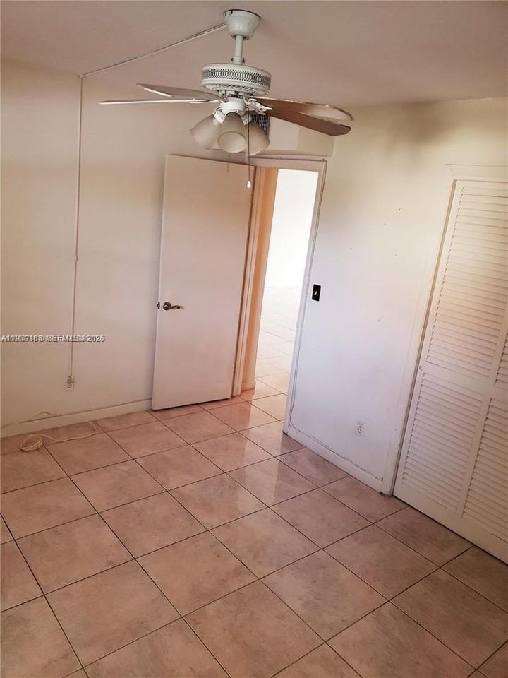 1450 Ne 191st St #201 - Photo 4 of 12