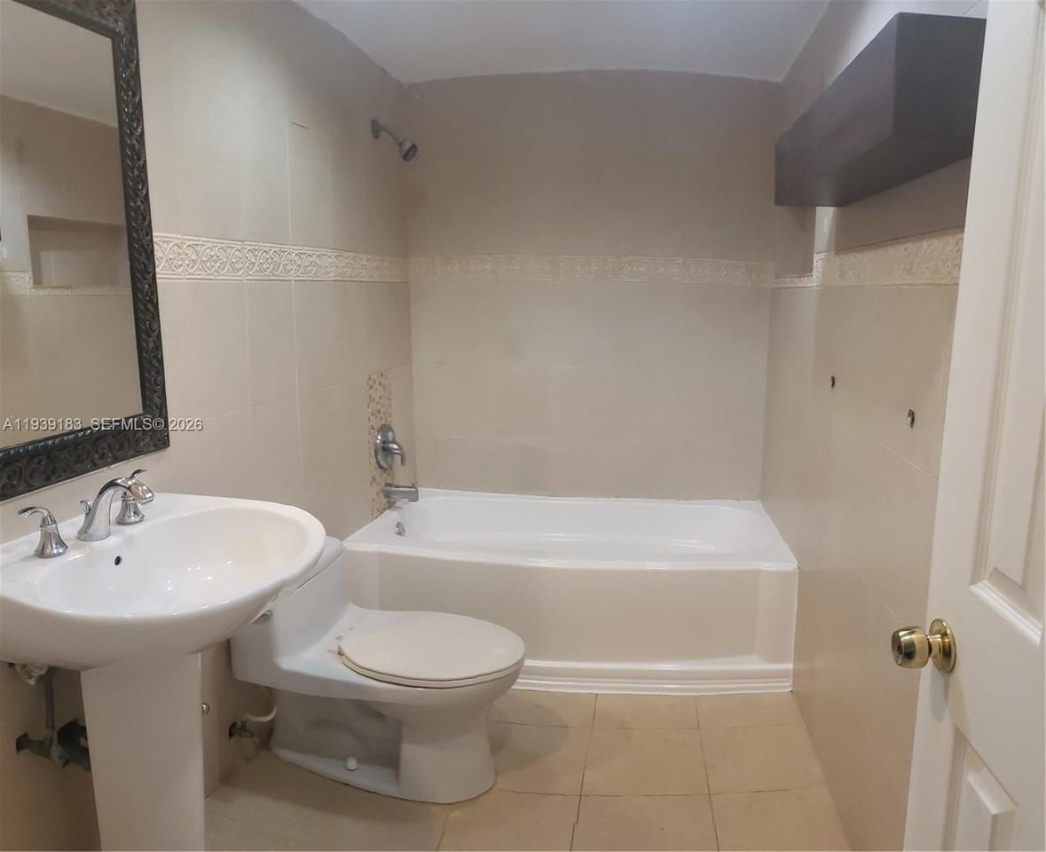 1450 Ne 191st St #201 - Photo 5 of 12