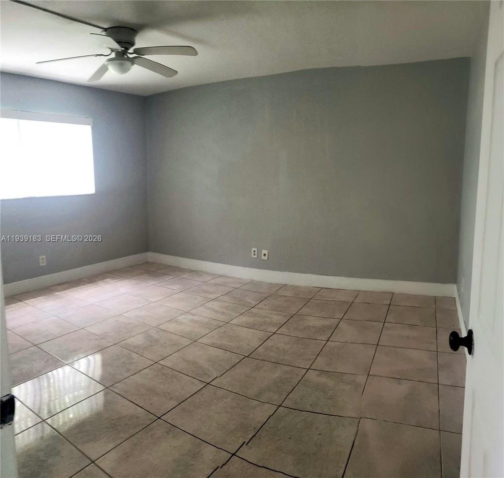 1450 Ne 191st St #201 - Photo 6 of 12