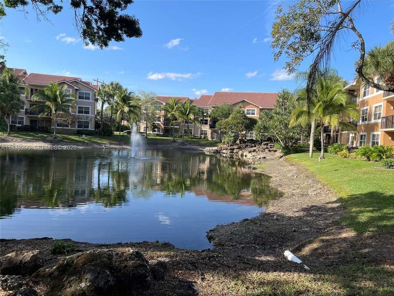 8821 Wiles Rd #101 - Photo 3 of 12