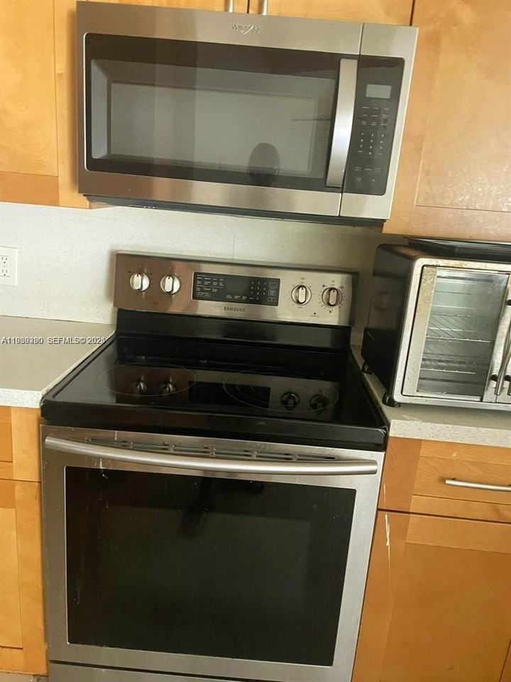 8821 Wiles Rd #101 - Photo 7 of 12