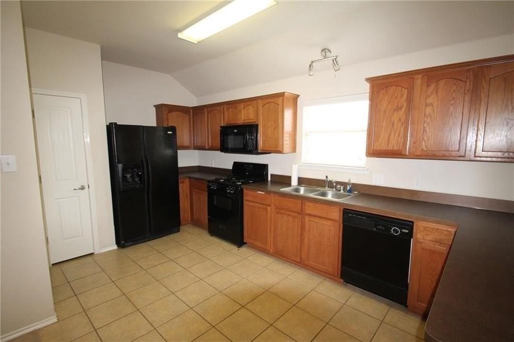 9605 Zaharias Dr - Photo 6 of 14