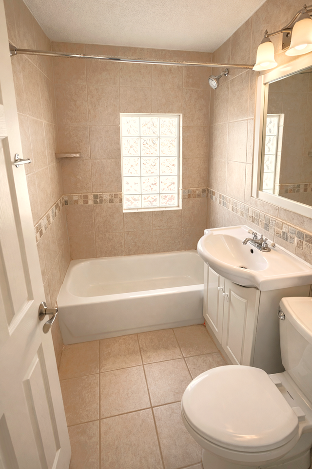 416 E 63rd Ter - Photo 6 of 13