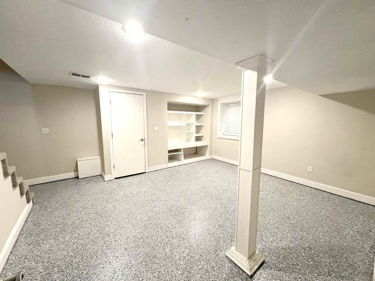 416 E 63rd Ter - Photo 7 of 13