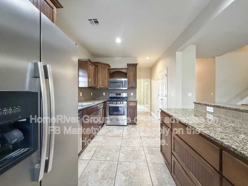 14005 E 101st St N - Photo 7 of 26