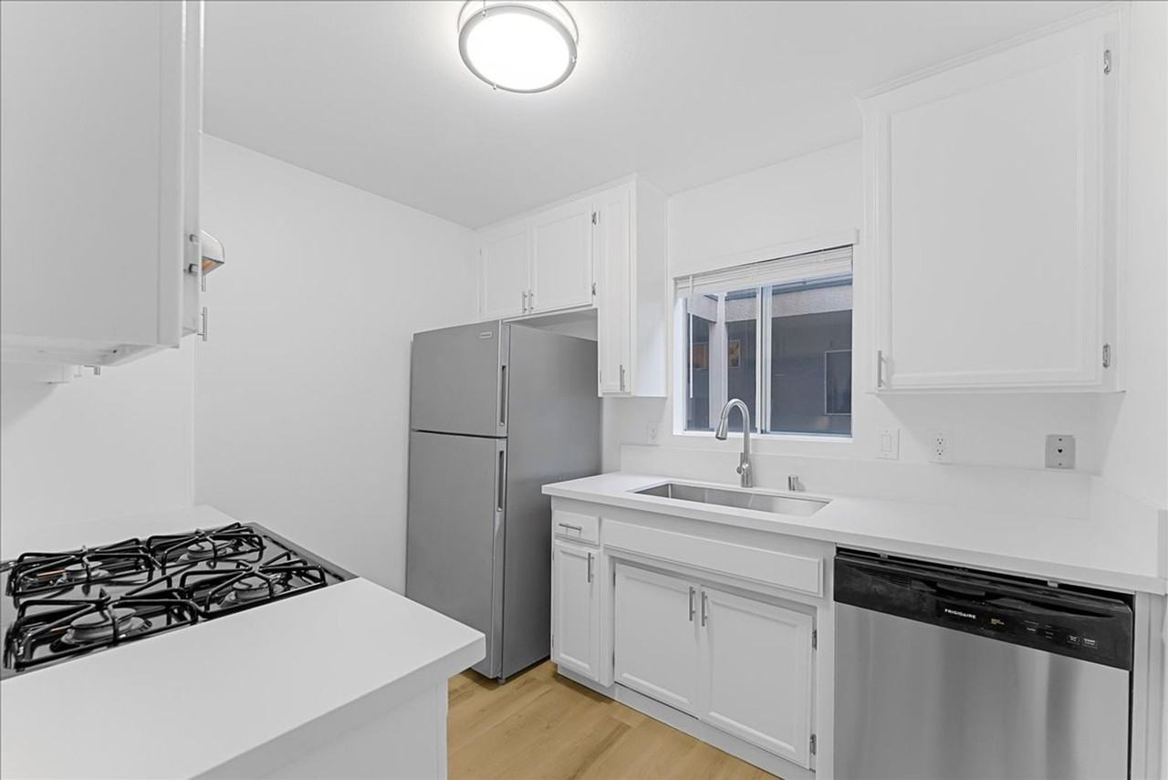 1785 Beloit Ave - Photo 3 of 17