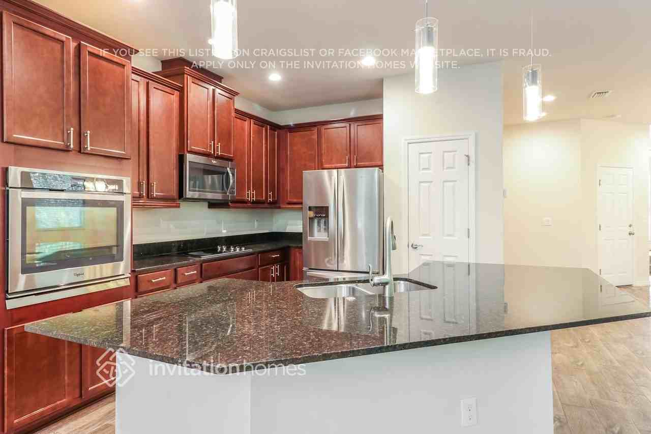 4954 Wandering Way - Photo 6 of 16