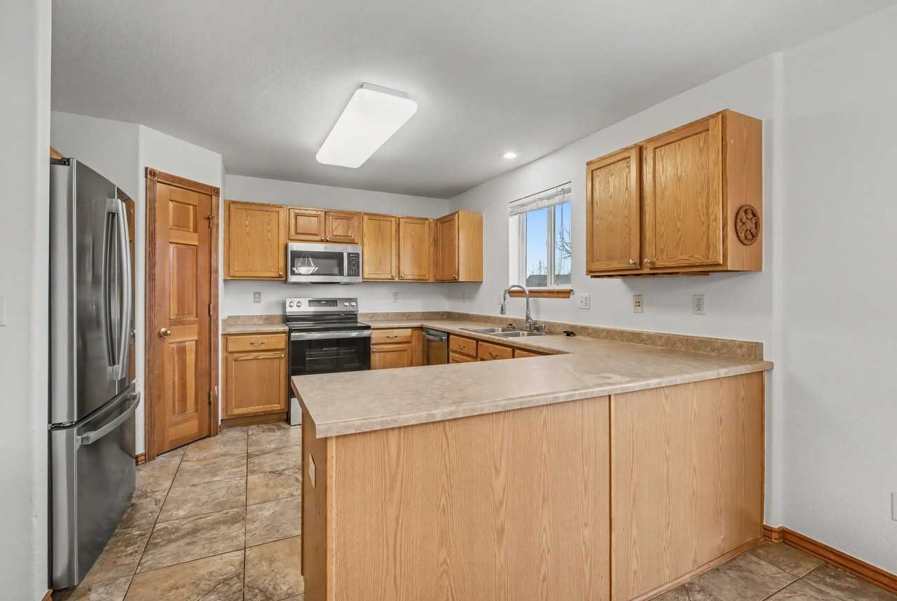 4528 W 63rd Dr #1 - Photo 3 of 28