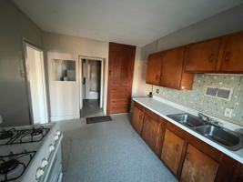 featured image of 103 W 1st St