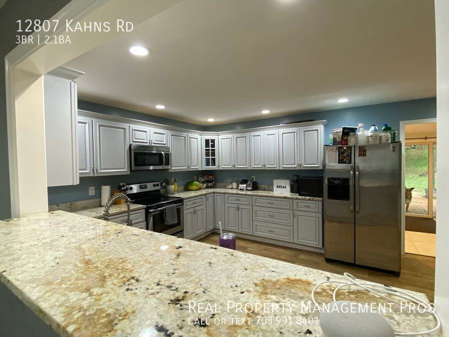12807 Kahns Rd - Photo 7 of 24