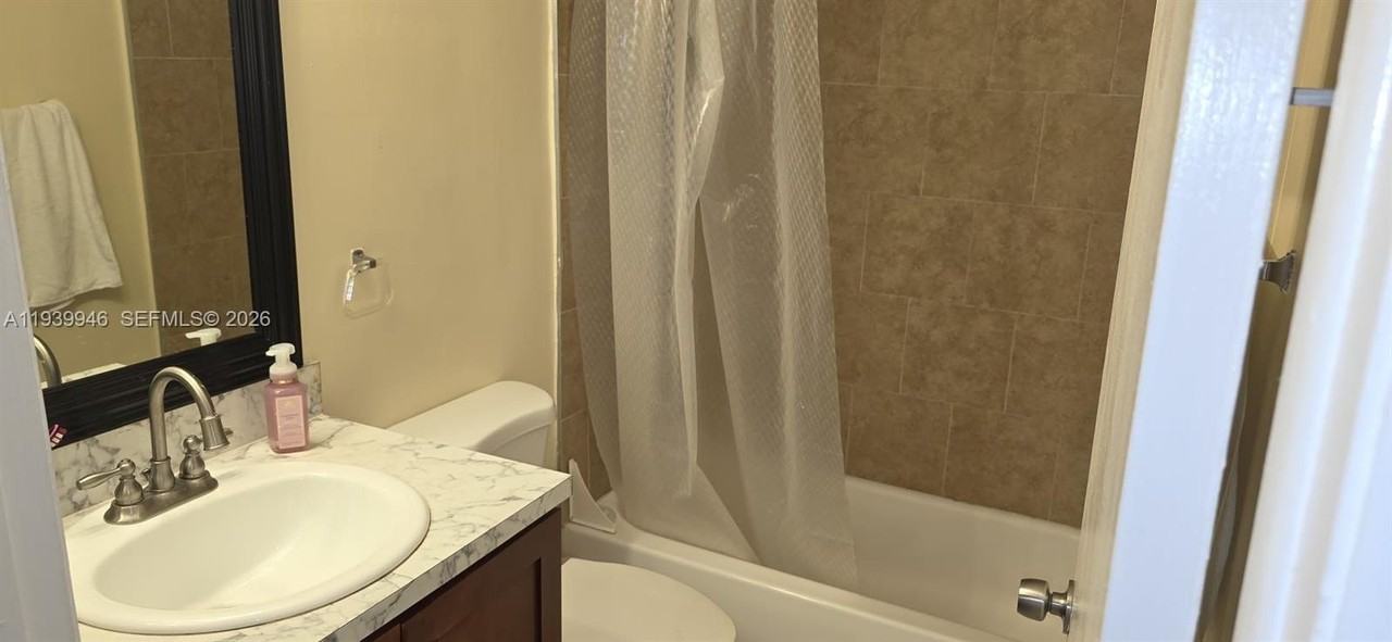 15304 Sunset Dr #28-14 - Photo 7 of 11