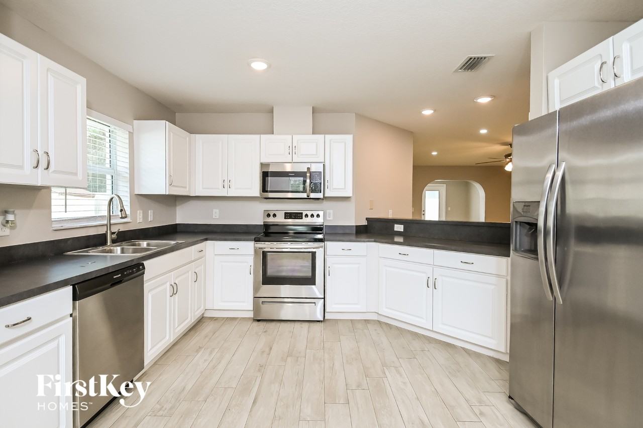 11202 Hidden Breeze Dr - Photo 6 of 15