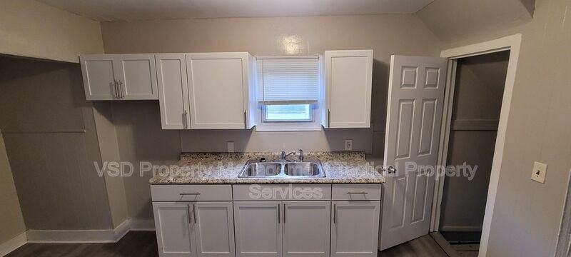 7523 Aetna Rd - Photo 5 of 14