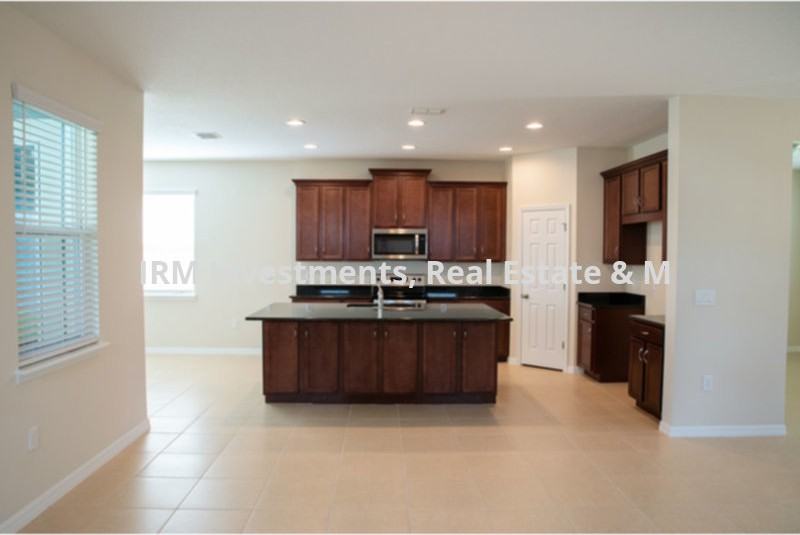 16626 Wingspread Loop - Photo 3 of 7