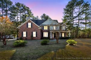 featured image of 480 Whispering Pines Dr