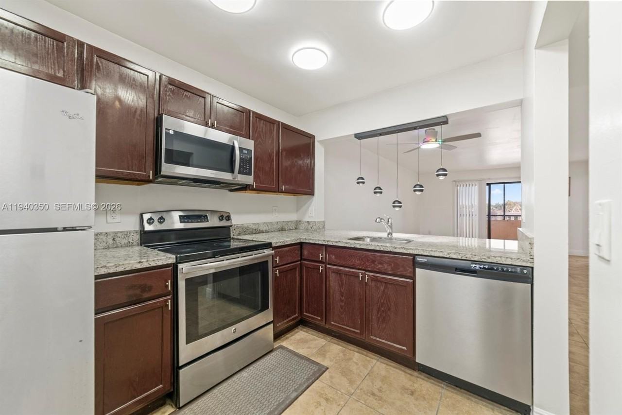 880 Ne 207th Ter #202-10 - Photo 2 of 15