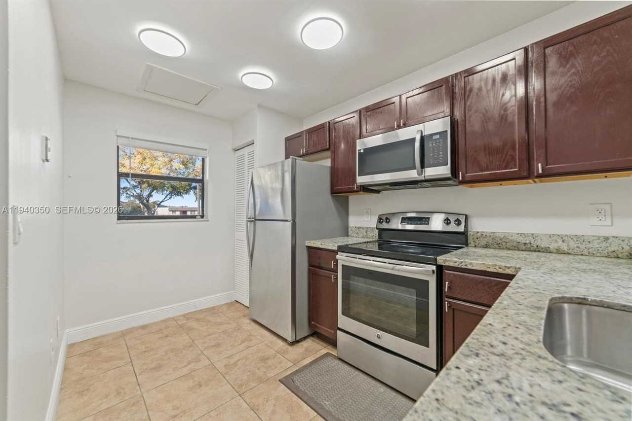 880 Ne 207th Ter #202-10 - Photo 3 of 15