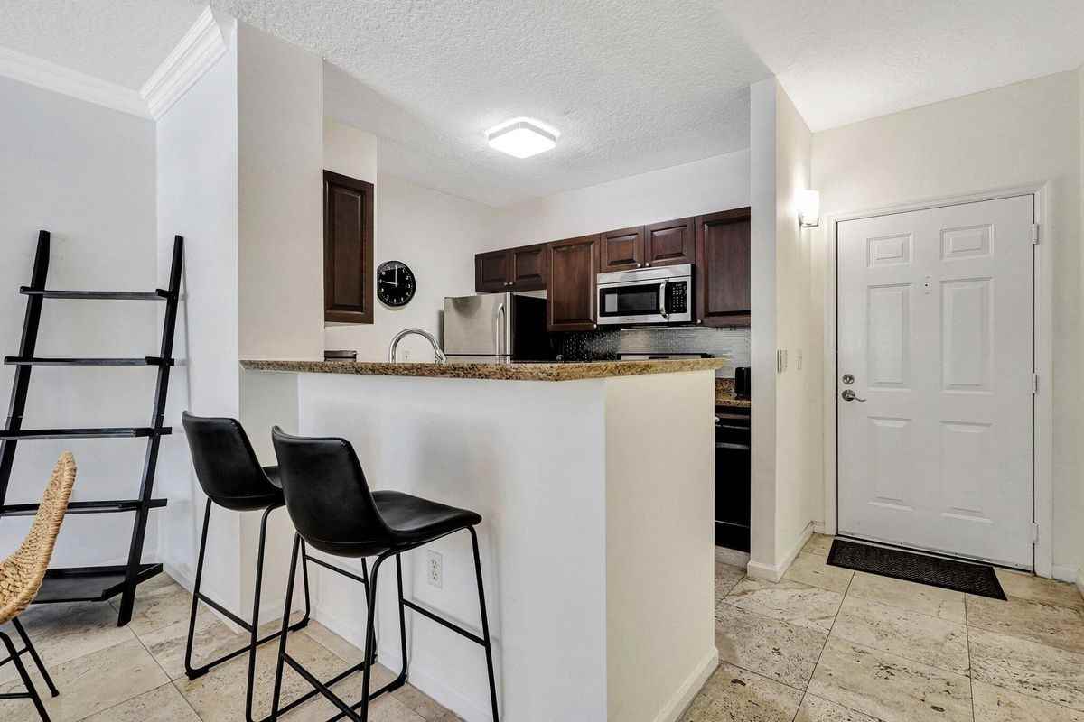 580 S Sapodilla Ave ##105 - Photo 2 of 11