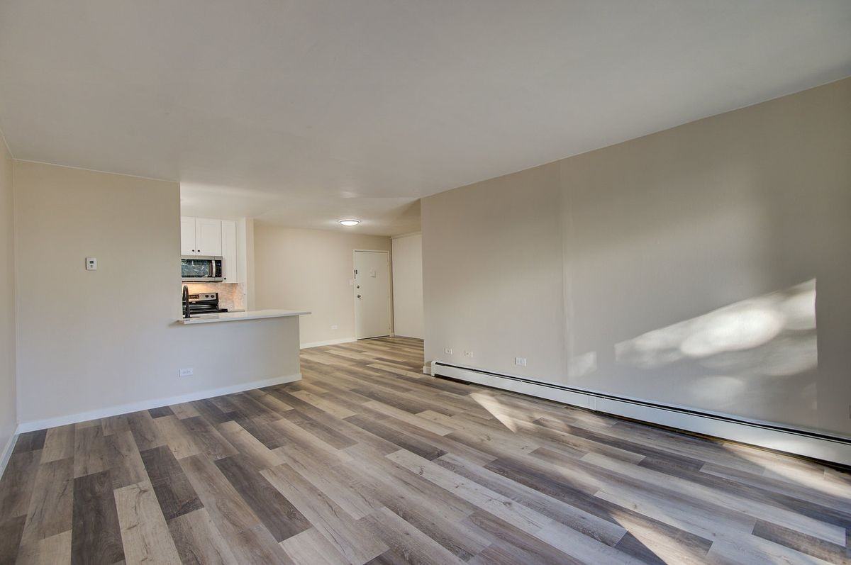 2231 S Vaughn Way - Photo 2 of 25