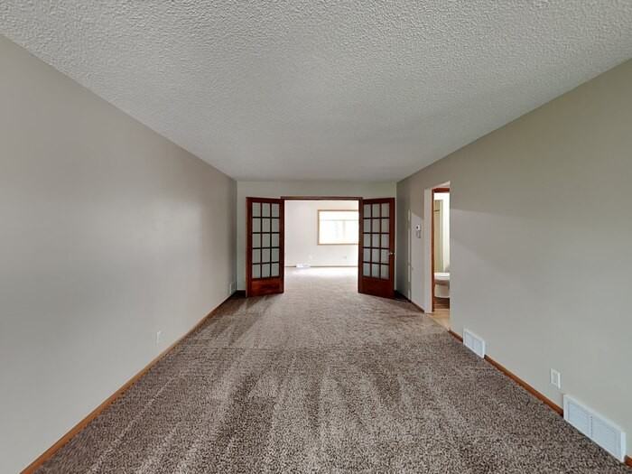 3405 Ensign Ave N - Photo 3 of 26