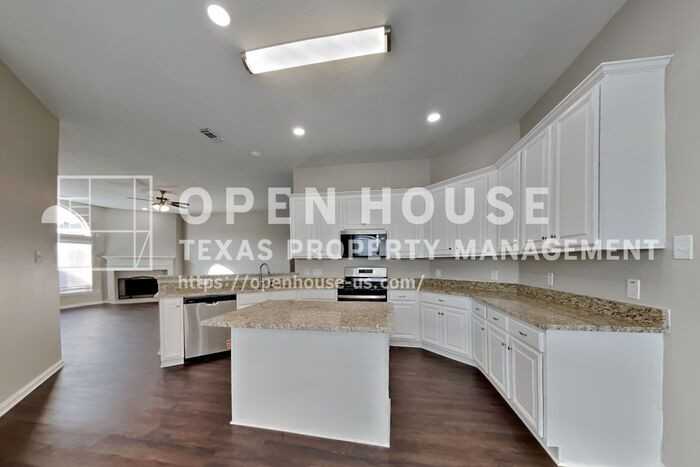 7002 Winter Blossom Dr - Photo 6 of 24