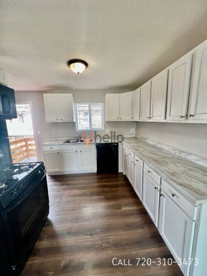 982 S Sheridan Blvd - Photo 4 of 12