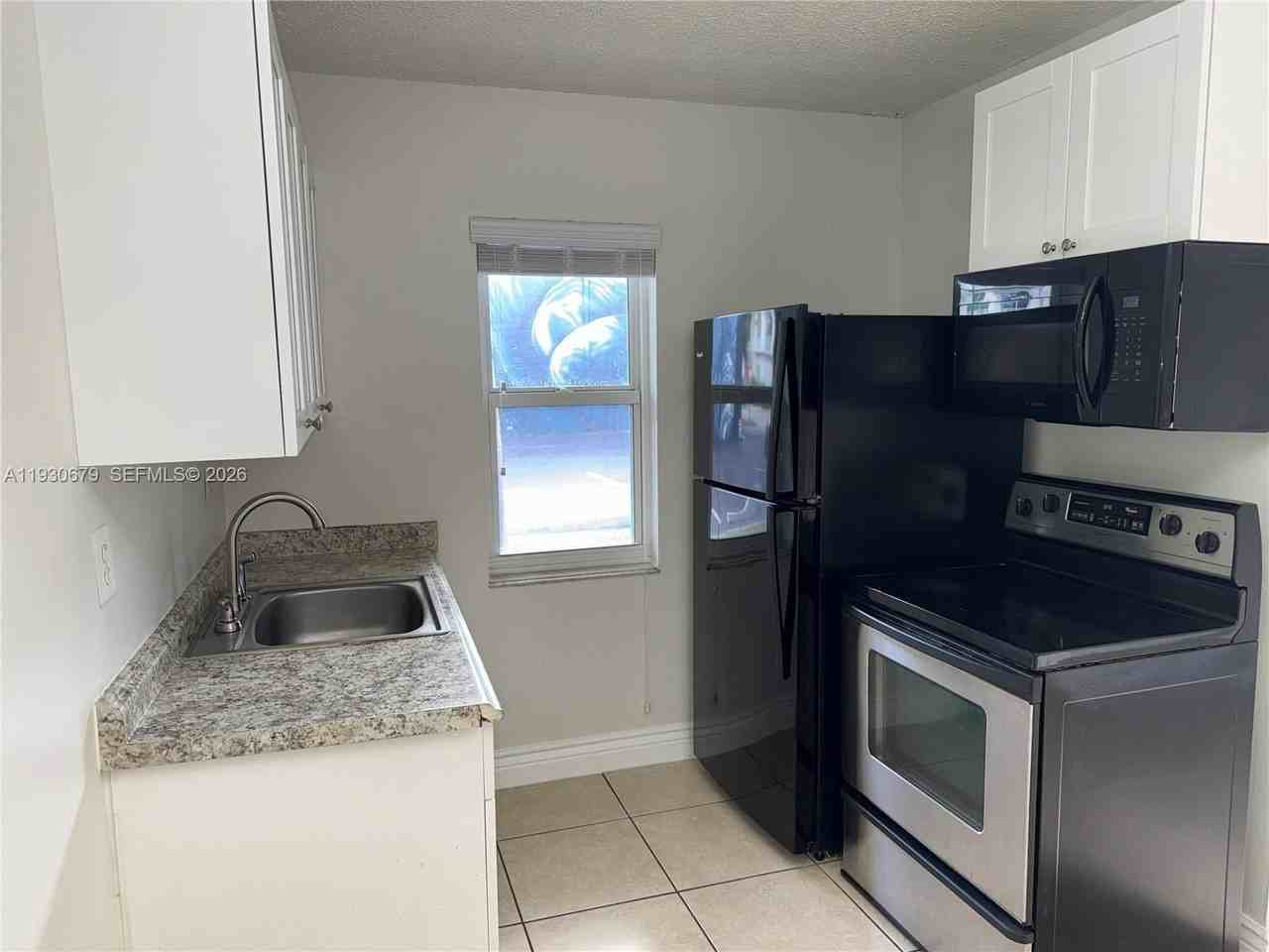 711 Ne 2nd Ave #102 - Photo 7 of 10