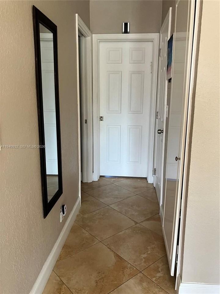 455 Golden Isles Dr #207 - Photo 3 of 8